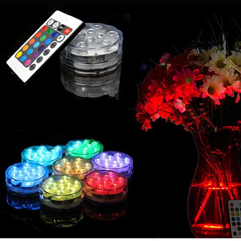 http://www.amazon.com/Amoker-LED-Submersible-Lights-Centerpiece/dp/B00MO12YJI/ref=aag_m_pw_dp?ie=UTF8&m=A28F619MXKYKE7 Vase Fish Tank, Led Accent Lighting, Christmas Stage, Fountain Lights, Submersible Led Lights, Wedding Venue Decorations, Cube Light, Fish Tank Decorations, Candle Lamp