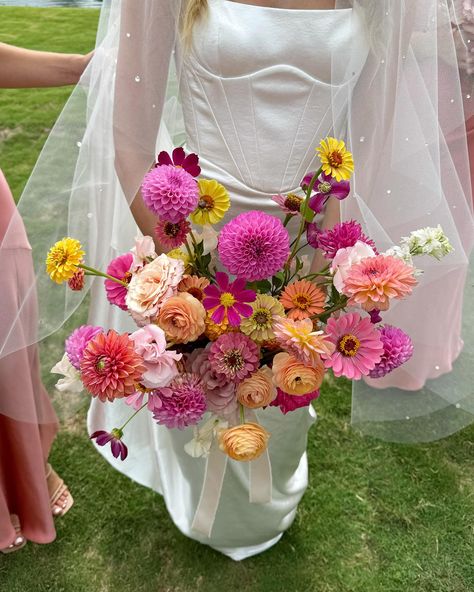 Currently obsessed with COLOR ✨ #bridalbouquet #colorful #summerwedding #pinkwedding #dahlia #zinnia #gardenrose #tulsaflorist #okcflorist #floristreview #floraldesign Zinnias Wedding, Wedding Cake Dahlia, Zinnia Bridal Bouquet, Zinnia Wedding Bouquet, Zinnia Wedding, Dahlia Bridal Bouquet, Dahlia Wedding Bouquets, Pink Dahlias, Dahlias Wedding