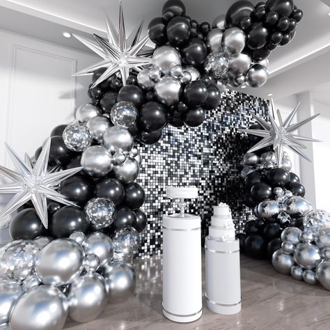 PRICES MAY VARY. BALLOON GARLAND ARCH KIT PACKAGE: 201pcs balloons Include 22''(Silver explosion star balloons 3pcs), 12''(Black balloons 20pcs, Silver balloons 11pcs, Silver confetti balloons 11pcs),10''(Black balloons 50pcs, Silver balloons 30pcs), 5''(Black balloons 30pcs, Silver balloons 33pcs, White balloon 10pcs, Silver balloons 17pcs),16FT garland strip x1,100 dots glue HIGH QUALITY MATERIALS: All black and silver balloons are made of high quality latex, which are durable and non-toxic. L Disco Balloons Decoration, Black And Silver 25th Birthday, Black And Silver Party Aesthetic, New Year’s Eve Balloon Garland, Black And White 40th Birthday Party, Black And White Gala Decor, Balloon Set Up, Black And Silver Balloon Arch, Black And White Grad Party