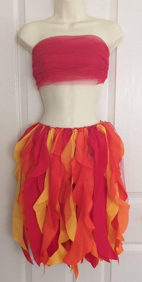 NOTE: PLEASE GIVE ME YOUR MEASUREMENTS WITH YOUR ORDER. READ BELOW                   THIS LISTING IS FOR THE SKIRT ONLY. THE TOP IS JUST A PHOTO PROP. This beautiful Fairy skirt is perfect for your Fire Fairy Costume! I make it with strips of light fabric so is flows beautifully.  It is NOT LINED. 1. THE SKIRT IS MADE TO TIE AROUND YOUR WAIST. PLEASE GIVE ME THE MEASUREMENTS WITH YOUR ORDER. 2. Chose from short (maximum length 14 inches), medium (maximum length 25 inches) or long (to floor) also Fire Skirt Costume, Goddess Of Fire Costume, Leaf Skirt Diy, Diy Fire Costume Women, Fire And Water Costume, Diy Fire Costume, Fire Fairy Outfit, 4 Elements Costume, Fire Goddess Costume