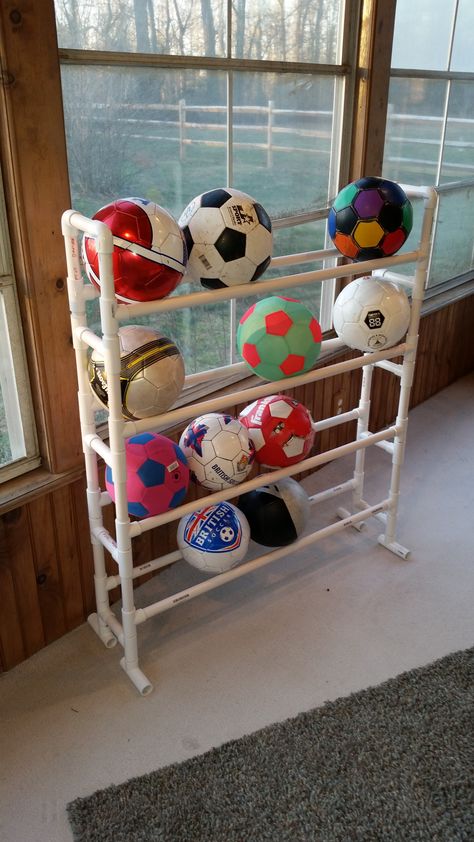 Soccer/basketball rack. Ball Storage Playroom, Equipment Storage Ideas, Pvc Pipe Projects, Pvc Projects, Garage Organization Diy, Ball Storage, Equipment Storage, Soccer Equipment, Luge