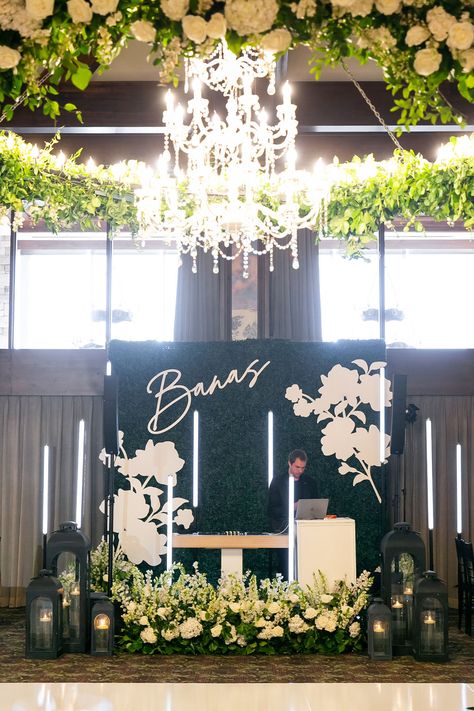 Dj Backdrop Wedding, Wedding Dj Booth Decor, Wedding Backdrop Reception Neon Sign, Wedding Dj Setup Stage Decorations, Wedding Dj Booth, Dj Booth Floral Installation, Dj Uplighting Wedding, Wedding Color Schemes Spring, Monochrome Painting