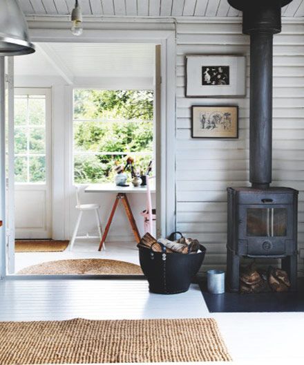 Simple, rustic summer house, cottage.  horizontal, painted plank walls.  Denmark. Scandinavian Fireplace, White Cabin, Plank Walls, Casa Vintage, Style Cottage, Scandinavian Living, Scandinavian Home, Wood Burning Stove, A Living Room