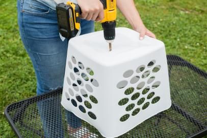 Upcycle a Plastic Laundry Basket Into a Summery Planter | HGTV Diy Cheap Planters, Diy Extra Large Planters Outdoor, Upcycled Planters Outdoor, Upcycle Plastic Plant Pots, Patio Planters Outdoor, Trash Can Planter Ideas, Backyard Planter Ideas, Cheap Planter Ideas, Diy Planter Pots