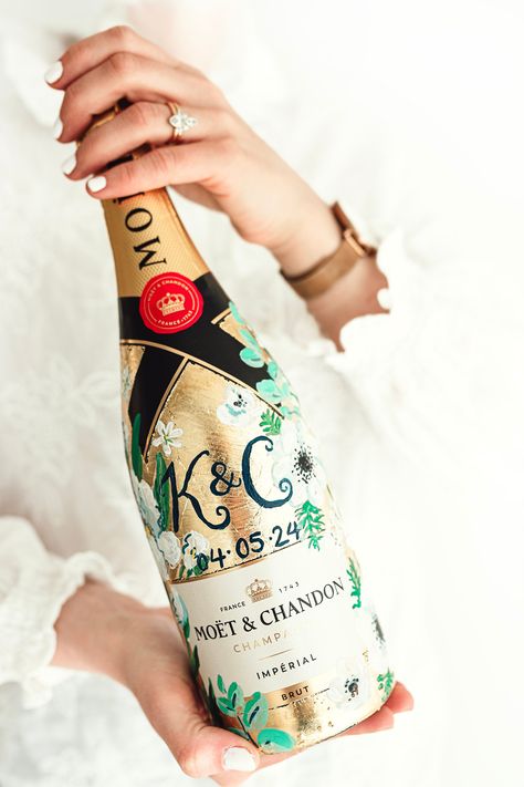 This custom hand painted Champagne Bottle makes a unique gift for any special occasion. Perfect for Wedding, Bridal party, Baby shower, Wedding Anniversary, New Home, Retirement, Big birthday...the list goes on.  Each bottle is designed to your unique requirements. Taking inspiration from a colour palette or florals to any other special icons or symbols you require. The example in the images is based on the wedding flowers of the couple.  You have the option to leave the base of the bottle plain Anniversary Champagne Bottle, Painting Champagne Bottles, Hand Painted Champagne Bottle, Wedding Champagne Bottles, Wedding Gift Etiquette, Painted Champagne Bottle, Bottle Paintings, Personalized Champagne Bottles, Last Minute Wedding Gifts