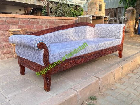 * Hand Carved Solid teak wood Day Bed, South Indian design Diwan bed.  * Size-, widh 57" depth 24" in inches.  * Material - Mango Wood  * Before placing the order customer can send message to Seller and check availability and Delivery Information.  * I manufacturing high quality solid Teak wood swing, I have high skilled artisans they can make those types which types you imagine in your mind. * Size and colour i can change as per buyers requirements. * With this swing i provide brass chain who make Luxury look for your home. * Rajasthani and South Indian Royal families like this Diwan.  * For suggestion and Customisation buyers can send message before placing the order. Diwan Bed, South Indian Design, Wood Day Bed, Diwan Sofa, Unique Seating, Day Bed, Sofa Couch Bed, Hand Crafted Furniture, Couch Furniture