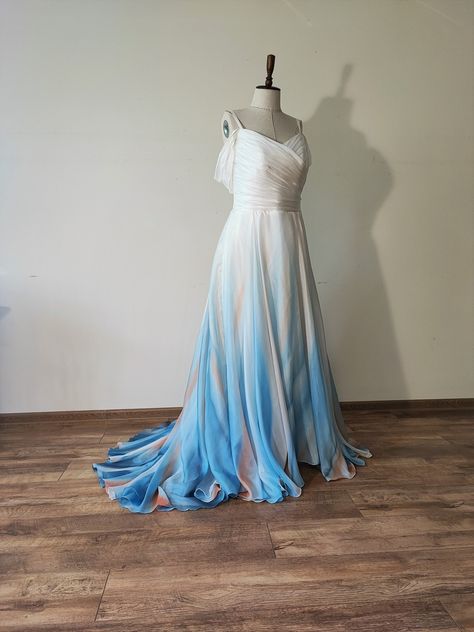 "\"Sea\" wedding dress/skirt. Hand painted silk wedding dress/skirt. Beach wedding dress/skirt  Colors of your choice. The bodice of the dress can be made according to your desired pattern. If you liked this skirt/dress, check out our other similar model: https://www.etsy.com/listing/1513537614/new-sea-ombre-wedding-dressskirt-beach Be NOTED!  It takes at least 5-6 months to make this painted dress model. When ordering on Etsy the table gives the longest period of two months. Please have in mind the necessary period of making it.  ✄----------------------- This dress will be custom made to best fit each unique body. ✄--------------- In order to do that, contact me and I will send you the full required measurements for the dress/skirt. ✄------- I would be happy to answer any given questions Nautical Wedding Dress, Ocean Theme Dress, Water Inspired Dress, Ocean Inspired Dress, Ocean Themed Dress, Wedding Dress Colors, Colorful Wedding Dress, Wedding Jumpsuits, Wedding Dress Skirt