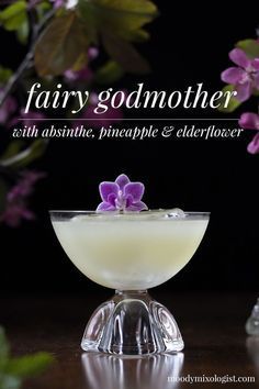 Absinthe is a potent liquor, but if you enjoy the flavor of anise, it can be used successfully as a base spirit! My Fairy Godmother recipe combines the “green fairy” with elderflower, pineapple… More Absinthe Cocktail, Elderflower Cocktail, Boozy Drinks, Fancy Drinks, Cocktail Drinks Recipes, Alcohol Drink Recipes, Drinks Alcohol Recipes, Fairy Godmother, Alcohol Recipes