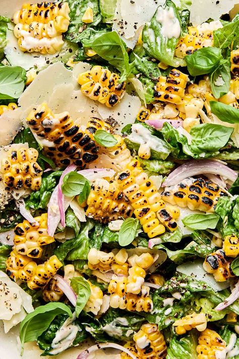 A summer-inspired Sweet Corn Caesar Salad! Replace classic Caesar's toasty croutons with juicy-sweet charred corn kernels for smoky-sweet pops of texture in every bite. Just toss the sweet corn "croutons" with romaine lettuce, shaved parmesan, & creamy Caesar dressing for the ultimate summer salad, ready in 20 minutes! (Gluten-Free; easily Vegetarian, Vegan, & Dairy-Free) #caesarsalad #corncaesarsalad #caesarsaladwithcorn #cornsalad #saladrecipes #saladideas #summerdinnerrecipes #dinnerideas Turkey Zucchini Meatballs, Creamy Caesar Dressing, Grilled Lemon Chicken, Zucchini Meatballs, Charred Corn, Shaved Parmesan, Satisfying Salads, Caesar Salad Recipe, Caesar Dressing