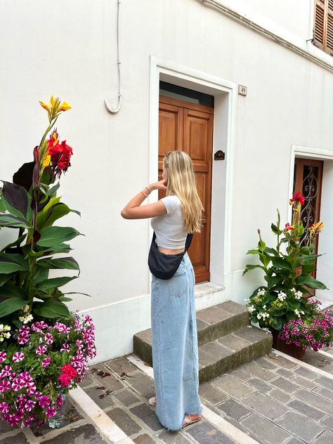 maxi denim skirt, grey top, uniqlo bag, italian architecture, plants, flowers Denim Skirt Outfit Fall 2024, Uniqlo Round Mini Shoulder Bag Outfit, Uniqlo Dumpling Bag Outfit, Uniqlo Moon Bag Outfit, Uniqlo Bag Outfit, Mini Shoulder Bag Outfit, Lisbon Outfit, Roadtrip Outfit, Uniqlo Winter