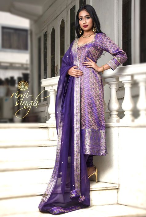 "KURBAT" Festive Winter 2019  Picture credits @houseofocf  Purple tanchoi silk kurta with hand embroidery on the neckline and sleeve  paired with a lycra churidaar and an organza dupatta with dots allover and tanchoi border on four sides and sleeve edge.  Available exclusively at  Rimi Singh Studio A 999 Sushant Lok 1  Gurgaon  #9818310054. Purple Kurti Combination, Silk Kurtis, Silk Kurti Designs, Stylish Kurtis Design, Bandhani Dress, Recycled Dress, Designer Kurti Patterns, Simple Kurti Designs, Kurta Neck Design