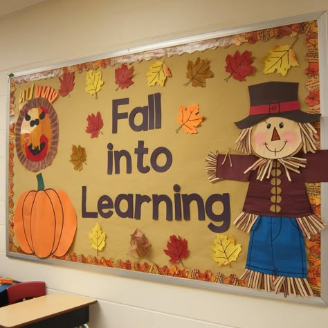 9 Fall Bulletin Board Ideas to Inspire Your Creativity Change Bulletin Board Ideas, Falling In Love With Learning Bulletin Board, Preschool Fall Classroom Decorations, Primary School Bulletin Boards, Diy Halloween Bulletin Board, Classroom Fall Decor Ideas, Outdoors Bulletin Board Ideas, Leaf Bulletin Board For Preschool, Fall Bulletin Boards With Student Work