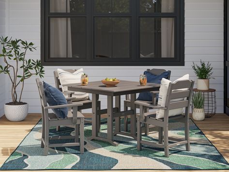 Level up your alfresco entertaining space with the allen + roth Oakport 5-Piece Dining Set, a linger-worthy set your family can kick back in for brunches, weekend barbecues, and beyond. Centered around a spacious dining table, the dining chairs’ casually charming aesthetic is highlighted by clean lines and reclined profiles. Expand the relaxation to the rest of your outdoor space with coordinating pieces from the allen + roth by POLYWOOD Collection. allen + roth by POLYWOOD Oakport 5-Piece Gray Polywood Patio Ideas, Polywood Outdoor Furniture, Grey Patio, 5 Piece Dining Set, Patio Cushions, Fire Pit Table, Patio Dining Set, Sit Back And Relax, Square Tables