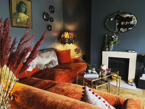 Orange Velvet Sofa, interior styled decor with vintage pieces.  Hollywood Regency gold and glass tables, vintage art glass. Orange Velvet Couch Living Room Ideas, Orange Vintage Couch, Orange Lounge, Orange Velvet Chair, Orange Sofa Decor Ideas, Orange Velvet Sofa, Orange Furniture Living Room, Living Room Decor Orange, Burnt Orange Living Room