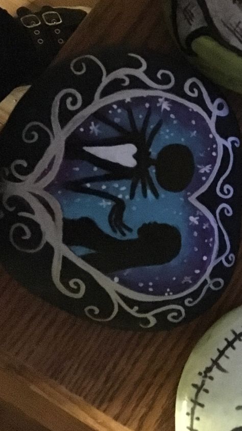 Jack and Sally rock! Jack And Sally Rock Painting, Jack And Sally Painted Rocks, Jack And Sally Painting, Fall Garden Decor, Rocks Painted, Fall Garden, Rock Ideas, Wood Slice Ornament, Sketch Ideas