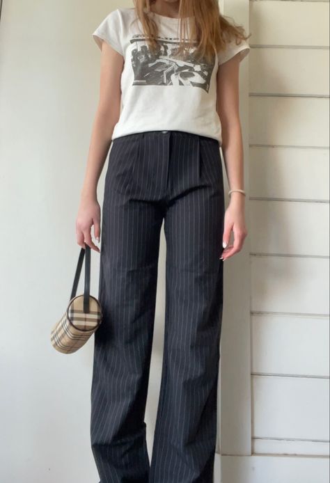 Pin Stripe Pants Women, How To Style Pin Stripe Pants, Striped Work Pants Outfit, Pin Stripe Pants Outfit Aesthetic, Pinstripe Trousers Outfit Casual, Navy Pin Stripe Pants Outfit, Black Pinstripe Trousers Outfit, Pin Stripe Trousers, Brown Pinstripe Pants Outfit