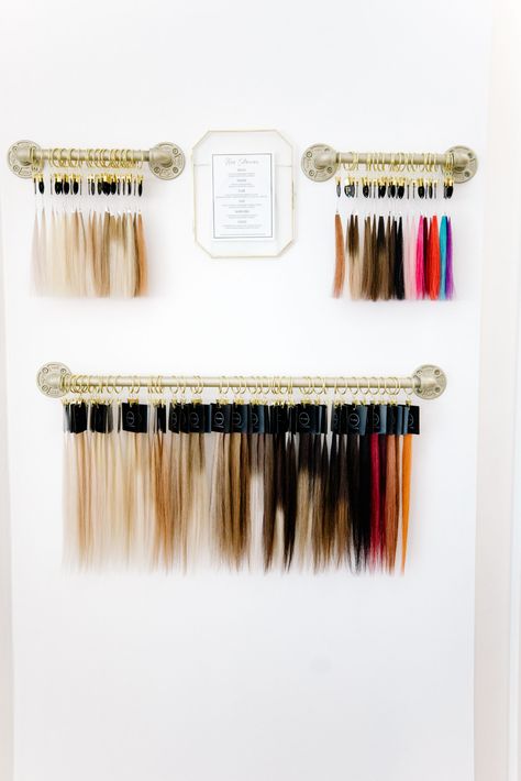 Hair Extension Retail Display, Hair Extensions Display Wall, Hair Extension Wall Ideas, Hair Extension Display Wall, Hair Extension Wall Display, Suite Salon Ideas, Hair Extension Wall, Hair Salon Organization, Hair Extension Display Ideas