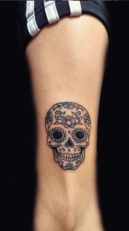 Mini Skull Tattoos For Women, Smiling Skull Tattoo, Girly Skull Tattoos Small, Spanish Skull Tattoo, Small Candy Skull Tattoo, Black And White Sugar Skull Tattoo, Simple Sugar Skull Tattoo, Small Skull Tattoo For Women, Mexican Themed Tattoos