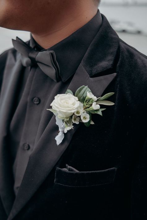 Black Suit Boutonniere, Green And White Wedding Boutonniere, Boutonniere For Groom, Ivory And Green Boutonniere, All Black Suit With Sage Green Tie, Emerald Green Wedding Boutonniere, Sage Green Boutonniere Groomsmen, Groom Black Suit Sage Green Tie, Black Suit With Sage Green