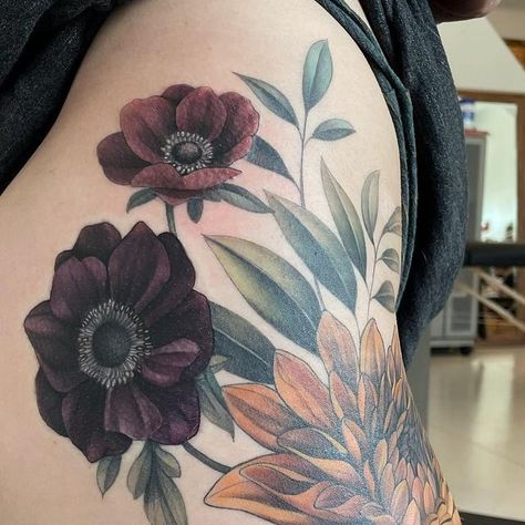 Black And Purple Flower Tattoo, Flower Thigh Garter Tattoo, Dark Colored Tattoos, Color Over Black Tattoo Cover Up, Dark Purple Flower Tattoo, Dark Color Flower Tattoo, Moody Floral Tattoo, Big Flower Tattoo Designs, Color Shading Tattoo