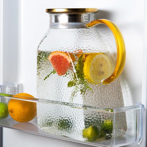 PRICES MAY VARY. ✅*Ideal Fridge Pitcher - Unlike the big bally jug take up the main room in your refrigerator, WARMSIMPLE design an unique flat body glass tea pitcher for the fridge side door which frees up more space!!! ✅*Perfect Capacity Pitcher - The 1800ml/63OZ water pitcer can meet a home drink dispenser need like homemade iced tea, juice, sangria, cocktail, coffee or milk The WARMSIMPLE hammered pattern leakproof glass water jugs work well for party entertaining, picnic,bar beverage contai Picnic Bar, Homemade Iced Tea, Glass Water Jug, Pitcher With Lid, Iced Tea Pitcher, Fridge Shelves, Juice Pitcher, Tea Pitcher, Tea Juice