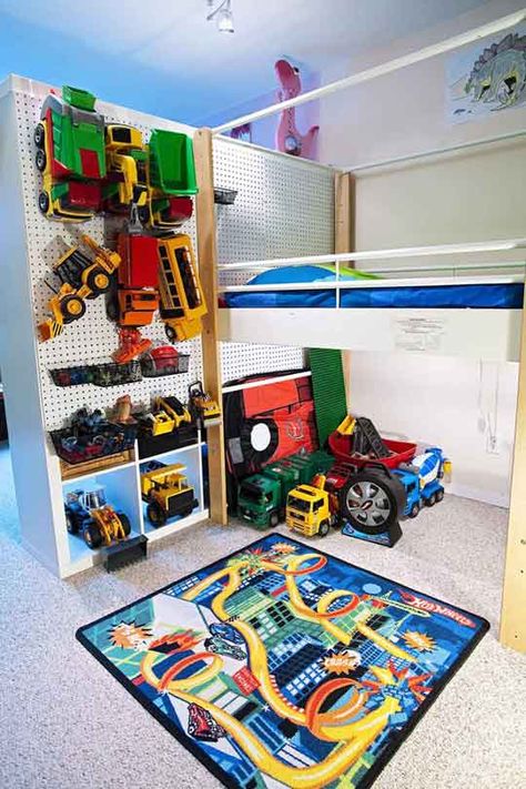 Love the peg board idea..thinking of placing some next to son's bed Space Kids Room, Truck Storage, Playroom Organization, Kids Room Organization, Kid's Bedroom, Stylish Storage Solutions, Organization Kids, Toy Rooms, Big Boy Room