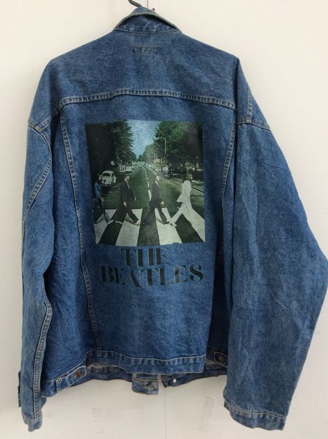 THE BEATLES Print jacket. Customers will receive a medium blue denim jacket of their chosen size with the design printed by us. JACKET DETAIL The jacket customers will receive will be 80's vintage trucker denim jackets from Europe and America with 2 front pockets and 2 side pockets and V shopped lining on front of each pockets. All out jackets are in vintage condition they will have a lightly worn fantastic authentic vintage feel, may have very minor marks of fraying to cuffs or collars & oc Beatles Design, Beatles One, Denim Jeans Jacket, Vintage Feeling, Iconic Album Covers, Jean Bleu, Jeans Jacket, Blue Denim Jacket, Cool Jackets