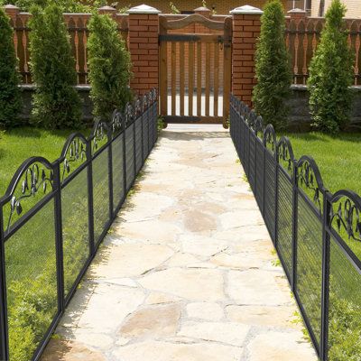 The garden border fencing features cute leaves and flowers full of natural touch, making it blend with any garden, patio, and yard. Metal garden fence is measured at 31.5x31.5inch with 5pcs panels, you can freely adjust it to any shape you want, simply insert spiked feet into the soil without any tools. Perfect garden barrier to keep dogs, rabbits, and other small animals away from your plants. Need more fence panels to decorate your garden? | UNHO 3 ft. H x 3 ft. W Metal Fence Panel Metal in Bl Metal Garden Fence, Garden Barrier, Flower Garden Borders, Metal Garden Fencing, Metal Fence Posts, Metal Fence Panels, Decorative Garden Fencing, Backyard Gardens, Metal Gate