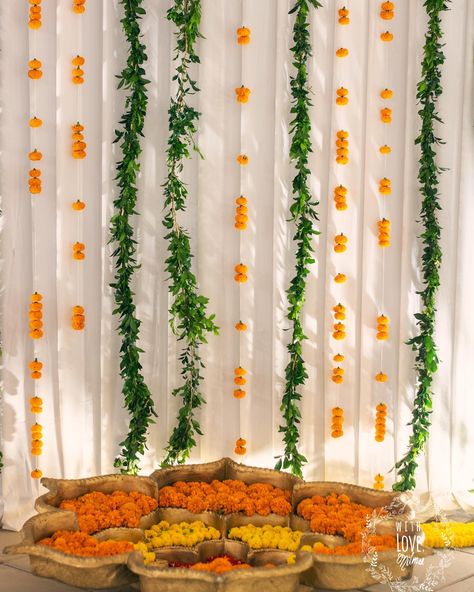 Genda Phool Decor Ideas That Will Never Go Out Of Trend! - ShaadiWish Genda Phool Decor, Dholki Decor, Genda Phool, Mehendi Decor Ideas, Mehendi Decor, Mandap Decor, Sustainable Wedding, Hanging Garland, Wedding Decor Inspiration