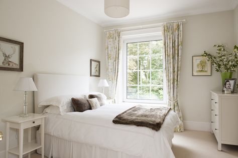 A guest room, painted in F&B’s James White, features honeysuckle print curtains, limed wood furniture from The Vintage Home Co in Westerham and delicate drawings and paintings of landscapes and woodland animals James White Farrow And Ball, Farrow And Ball James White, Bedroom Interior White, Bedroom Remodel On A Budget, White Kitchen Paint, Bedroom Remodeling, Kids Bedroom Remodel, White Wall Bedroom, Guest Bedroom Remodel