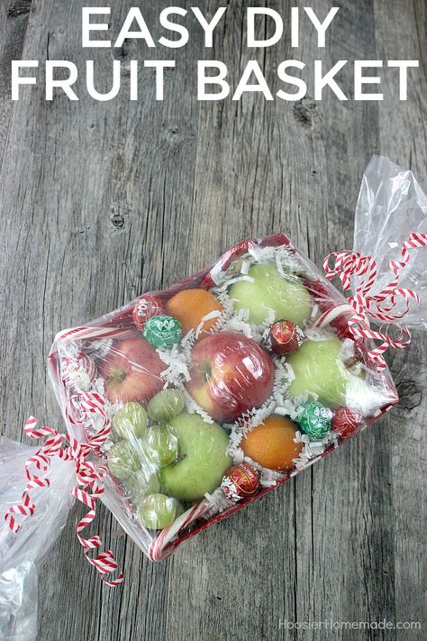 Christmas Fruit Gift Ideas, Making Fruit Baskets Gift Ideas, Fruit Basket Gift Ideas Diy, Diy Fruit Gift Basket, Homemade Fruit Baskets Gift Ideas, Fruit Wrapping Ideas, Christmas Fruit Basket Ideas Gift, Christmas Fruit Basket Ideas, Diy Fruit Basket Gift Ideas