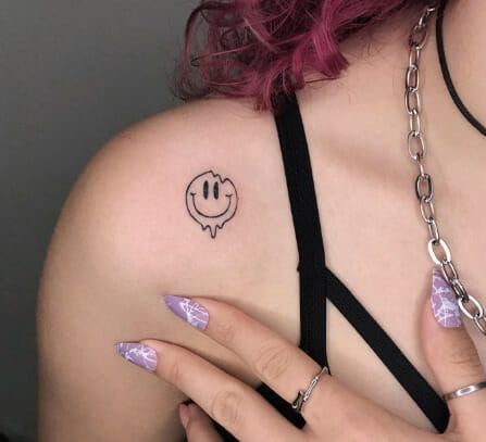 Drippy Smiley Shoulder Tattoos For Women Smiley Hand Tattoo, Melty Smiley Face Tattoo, Semi-colon Smiley Face Tattoo, Droopy Smiley Face Tattoo, Smiley Face Flower Tattoo, Happy Tattoos For Women, Melting Face Tattoo, Drippy Smiley Face Tattoo, Smiley Tattoo Design