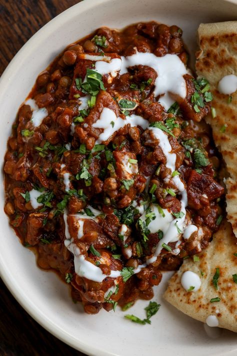 Lentils vindaloo is a plant-based version of vindaloo curry that has all of the same flavor profiles with a lot less work. Hearty lentils and potatoes are absolutely delicious in this tangy curry sauce! Lentil And Potato Curry, Vegan Garbanzo Bean Recipes, Garbanzo Recipes, Vegetarian Vindaloo, Lentils And Potatoes, Green Lentil Curry, Vegan Indian Dishes, Vindaloo Sauce, Asian Entrees