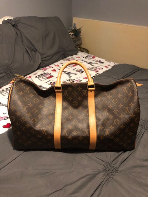 100% authentic as purchased from Fashionphile designer handbag & accessories website. Classic Louis Vuitton monogram in size 50. Keepall comes alone. Made in France 🇫🇷 Serial number pictured. Only used a couple times. Excellent condition! Well kept, clean inside, no stains, no odor. Exterior has some marks, small water spots, please see pictures. All piping & stitching intact. Questions welcomed  :) Thanks for looking! I ship fast! Final sale, no refunds, no returns. Sold as is. Piping Stitching, Accessories Website, Water Spots, Designer Handbag, Couple Time, Authentic Louis Vuitton, Handbag Accessories, Designer Handbags, Piping