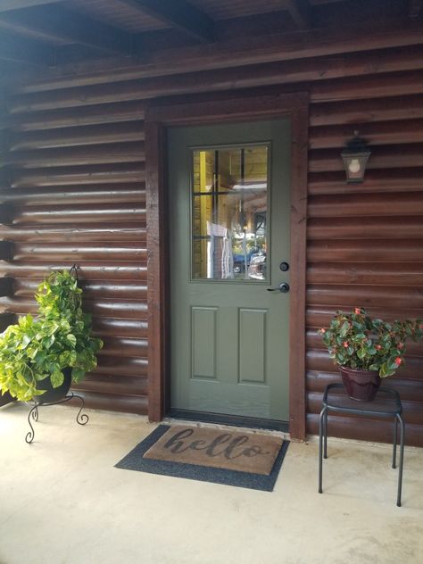 Log home w SW Garden Gate door Log Cabin Porch Ideas, Log Cabin Exterior Paint Colors, Log Cabin Front Door, Cabin Exterior Colors, House Doors Colors, Log Cabin Siding, Exterior House Doors, Log Homes Exterior, Log Cabin Exterior