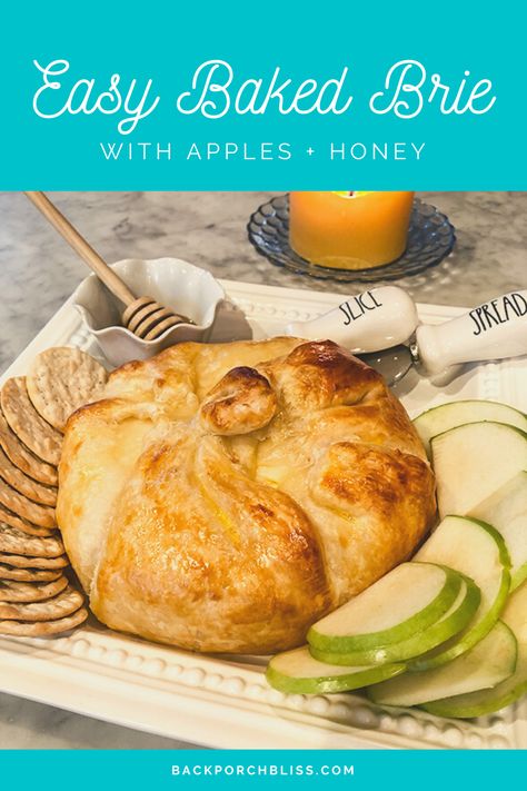 Baked brie with a wheel of brie + puff pastry; serve with lavash or water crackers, apples, and honey. A simple, yet elegant appetizer. #apples #appleseason #applerecipes #brie #appetizer #simpleappetizer #bhgrecipes #savannahbee #honey #backporchbliss #easyrecipes #fallrecipes #puffpastry Brie Cheese Recipes With Apples, Honey Apple Baked Brie, Baked Brie In Puff Pastry With Apples, Honey Almond Baked Brie, Baked Brie In Puff Pastry Honey, Baked Bree In Puff Pastry, Baked Brie With Apples, Baked Brie Honey, Baked Brie In Puff Pastry