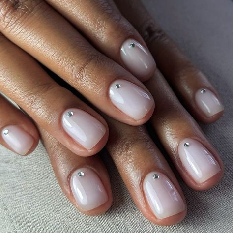 A milky bridal look by @polishedbylolo 🥛🫶🏾👰🏽💍 For this look she used Shield Fiber Base in #906 MILKY WHITE #kinetics #kineticsnails #weddingnails #bridalnails #weddinginspo #milkynails #perfectnails #buildergel #kineticnailsystems #milkynails #nudenails #minimalnails Milky White Nails With Gold Glitter, Milk White Manicure, Creamy White Nails Design, Milky Shimmer Nails, Clear Polish Nail Designs, Milky White Jelly Nails, Milky Grey Nails, White Base Nails With Design, Pearl On Nails