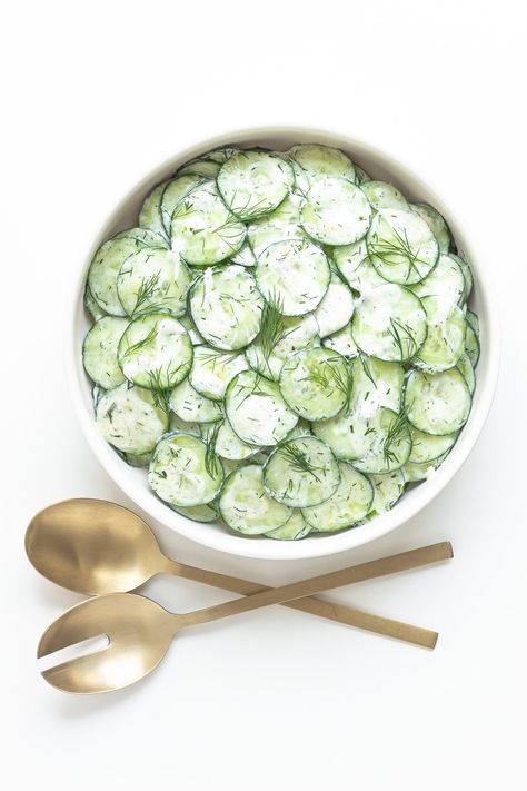 This refreshing Cucumber Yogurt Salad recipe features all the flavors of tzatziki in salad form. So if you love tzatziki, then you will love this creamy cucumber salad with all it's Greek and Mediterranean vibes. It’s loaded with crunchy cucumbers, creamy Greek yogurt, fresh dill, garlic and lemon. A quick and easy side dish that is SO GOOD! | www.mapleandmango.com Cucmber Salad, Cucumber Yogurt Salad, Healthy Cucumber Salad, Yogurt Salad, Cucumber Dill Salad, Mediterranean Vibes, Cucumber Yogurt, Rainbow Salad, Creamy Cucumber Salad