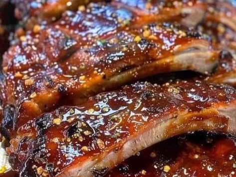 Sticky Honey Garlic Ribs: The Perfect Recipe - NewsBreak Sticky Ribs Recipe, Honey Garlic Glaze, Garlic Ribs, Pizza Grilled Cheese Recipes, Fluffy Buttermilk Pancake Recipe, Honey Garlic Ribs, Lobster Cream Sauce, Candied Walnut Recipe, Cheese Pork Chops