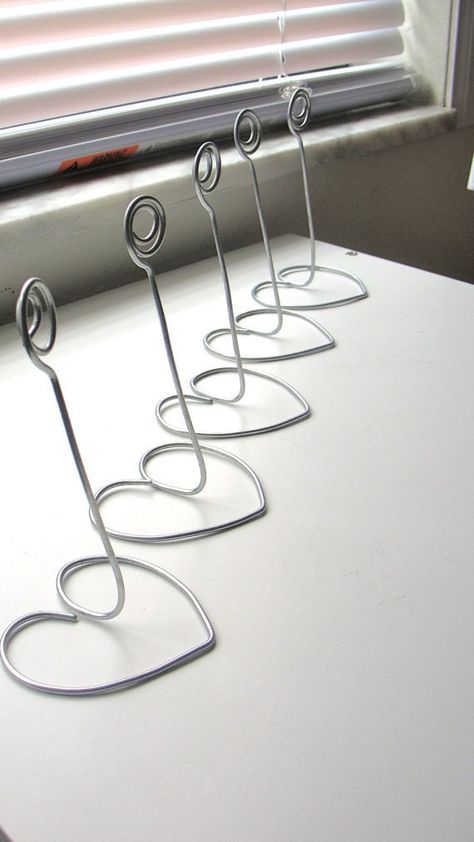 Wedding Table Number Holders, Wire Jig, Diy Table Numbers, Wire Ornaments, Wire Art Sculpture, Table Number Holders, Wire Diy, Silver Table, Wire Sculpture