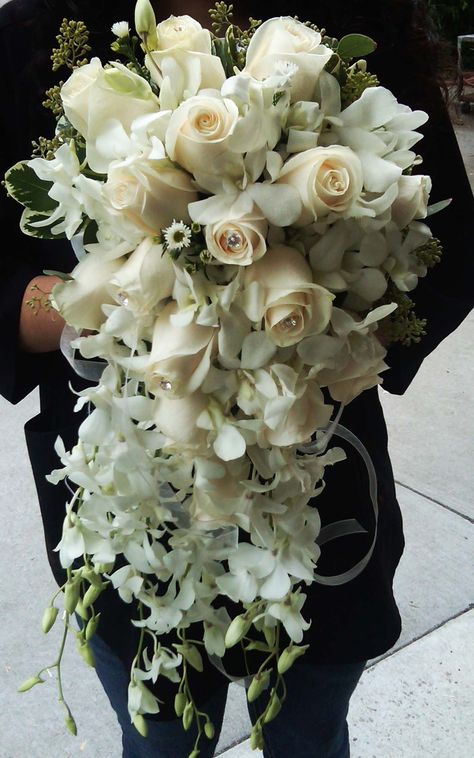 Traditional cascading bouquet, with "vendela" roses and white dendrobium orchids. Cascading Wedding Bouquets Summer, Wedding Bouquets Summer, Vendela Roses, White Dendrobium Orchids, Brides Flowers Bouquet, Elegant Wedding Bouquets, Cascading Bouquet, Spring Wedding Bouquets, Cascading Wedding Bouquets