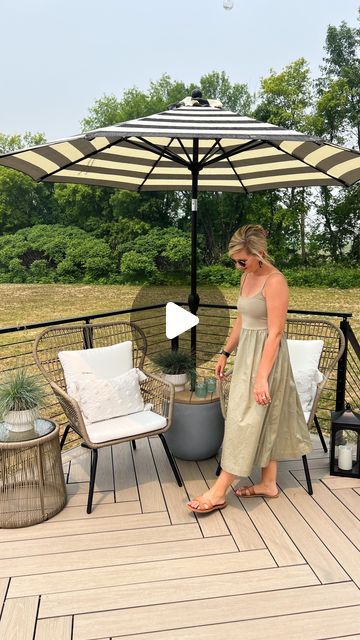 Sarah & Dan | DIY & Design on Instagram: "DIY UMBRELLA STAND TABLE✨ I love a good diy that’s beautiful & functional! We wanted to add seating to this little corner of the deck with an umbrella for shade. We are loving this chair set & umbrella from @walmart they really helped complete this space for a little summer oasis!    #walmartpartner #walmarthome #welcometoyourwalmart #likeit #diyumbrellastand #diypatio #umbrellastand   The chairs are on sale!! // Shop the links for the chairs, planters, umbrella and accessories over on my @shop.ltk - https://liketk.it/4bADv //" Outdoor Parasol Patio Umbrellas, Outdoor Umbrella Stand Ideas, Diy Umbrella Table Stand, Pool Umbrella Holder, Outside Shade Ideas Patio, Umbrella Stand Side Table Diy, Outdoor Patio Umbrella Ideas, Outdoor Umbrella Stand Diy, Diy Umbrella Side Table