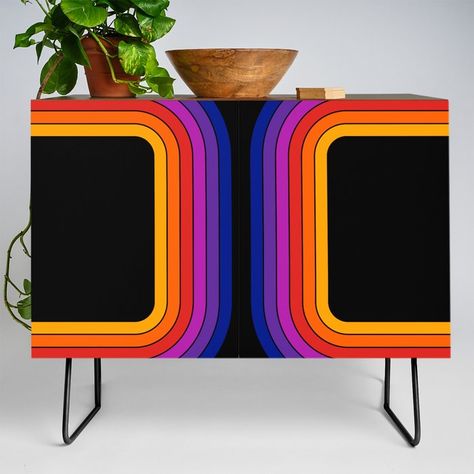 A true statement maker. Our versatile mid-century modern inspired credenzas are great for use as TV stands, armoires, bar carts, office cabinets or the perfect complement to your bedroom set. The vibrant art printed on the doors will make your piece pop in any setting. Available in a warm, natural birch or a premium walnut finish.      - 35.5" x 17.5" x 30" (H) including legs    - Steel legs available in gold or black    - Interior shelf is adjustable   - Wipe clean with damp cloth    - Assembly required          #### Please note: all furniture is custom-made and printed upon order. Returns are only accepted in the case of damage. We currently do not ship furniture outside of the United States.      For more info on furniture, visit our FAQ page [here](    Keywords: Colorfulness, Purple, R Artsy Apartment, Colourful Living Room Decor, Maximalist Decor, Black Rainbow, Pop Art Design, Modern Credenza, Funky Furniture, Bar Carts, Vibrant Art