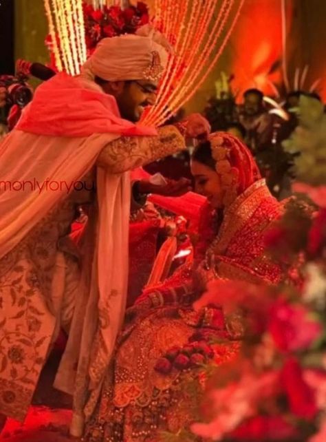 Hansika Motwani and Sohael Kathuria finally got hitched in a royal wedding on December 4, 2022. Dressed in their respective wedding ensembles, the couple looked stunning on their big day. Now, we have got hold of a priceless glimpse of their wedding, and it shows the couple's sindoor moment.    In the picture, we can see Hansika and Sohael inside their wedding mandap. Sohael was seen applying sindoor on his bride's forehead and left her blushing with happiness. The precious moment was to Sindoor Moment, Bridal Squad, Tower In Paris, Indian Wedding Photography Couples, Easy Hairdos, Indian Wedding Couple, Bride Photoshoot, Wedding Mandap, Groom Looks