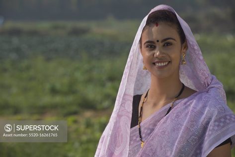 Portrait Of A Woman Standing In An Agricultural Field With Her Head Covered By Saree. Diverse Faces, Portrait Of A Woman, Woman Standing, Model Release, Head Covering, Nun Dress, Stock Photography, Photo Image, A Woman