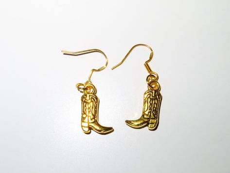 Cowboy boot earrings! 🤠 Pearl Clam, Cowboy Boot Earrings, Boot Earrings, Dolphin Tail, Turtle Earrings, Gold Dangle Earrings, Clam Shell, Earrings Pink, Cowboy Boot