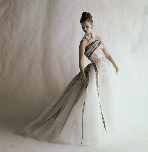 In advance of Olivier Rousteing’s couture debut, a look back at that of the house founder’s. Jerry Schatzberg, Balmain Dress, Vogue Vintage, Glamour Vintage, Pheasant Feather, Fashion 1960s, French Fashion Designers, Vintage Gowns, White Tulle