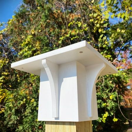 Mount your wooden house or feeder to a standard 4 x 4 post using this dependable and stylish Decorative White Post Mounting Bracket by Prime Retreat. This bright, white bracket's flat top features four pre-drilled holes and four included wood screws for easy connectivity, and a generous 8.875" square platform for affixing a large bird house or feeder. An extra support fin on each side of the lengthy collar lends a dash of flair to the piece, while the robust, all wood construction offers durabil Decorative Post, Wood Molding Trim, Platform Bird Feeder, Large Bird Feeders, Unique Bird Feeders, Large Bird Houses, Bird Feeder Plans, Bird Feeder Poles, Bird Houses Ideas Diy