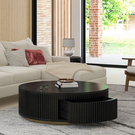 Large and oversized coffee tables have earned their name as trendy living room essentials. Coffee tables are relatively short tables that are mostly placed in the midst of a sofa arrangement or in front of armchairs. These unique and multidimensional pieces of furniture constitute an irreplaceable part of the room’s furniture as they form the Fluted Round Coffee Table, Black Round Coffee Table With Storage, Black Wood Coffee Table, Round Drum Coffee Table, Wood Bedroom Sets, Drum Coffee Table, Coffee Table With Drawers, Black Coffee Tables, Large Coffee Tables