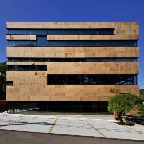 Strip windows create horizontal stripes across the facade of this office in Hokkaido, Japan, which won the Office category at World Architecture Festival 2015. Architecture Facade, World Architecture Festival, Commercial And Office Architecture, Office Building Architecture, World Architecture, Stone Facade, Hokkaido Japan, Building Architecture, Commercial Architecture